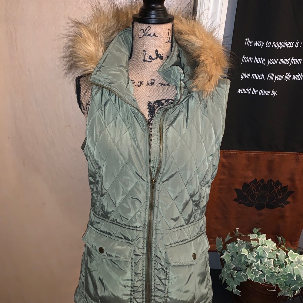 Green vest with fur hood